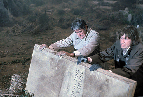 Gregory Peck and David Warner in the cemetery scene from The Omen (20th Century Fox 1976)