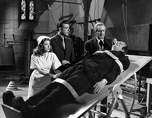 Nina (Jane Adams) and Larry Talbot (Lon Chaney) are a little concerned at Dr Edelmann’s (Onslow Stevens) interest in the Monster (Glenn Strange) in House of Dracula (Universal 1945)