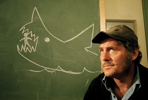 Robert Shaw as Quint in an early scene from Jaws (Universal 1975)
